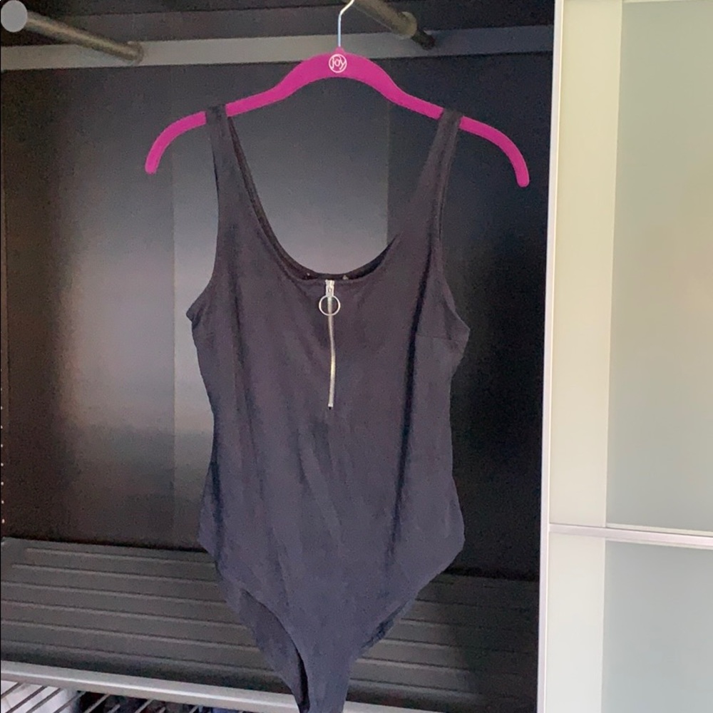 Navy blue quarter-zip body suit